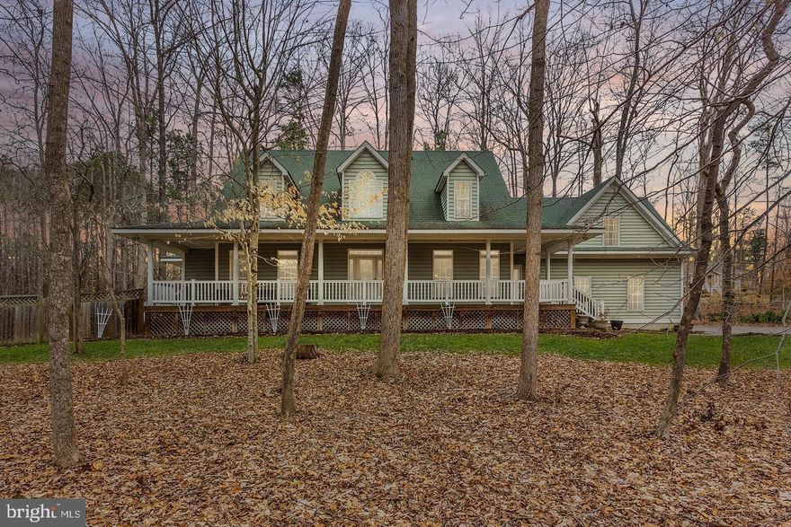 Beautiful custom 1.25 acre Lake Anna home with 2 Master suites, water access and deeded boat slip! On private/ warm side. $15,000 in mechanical upgrades, including a 1 year old Navien tankless water heater, and Carrier Heat Pump. 1st Floor Master with office on main level that could be additional bedroom. 4 Car Garage with workshop. Fenced yard. Storage galore! Large spacious kitchen with granite counters and stainless steel appliances. Large walk in closets in all bedrooms. Front and Back Porches. Must See!