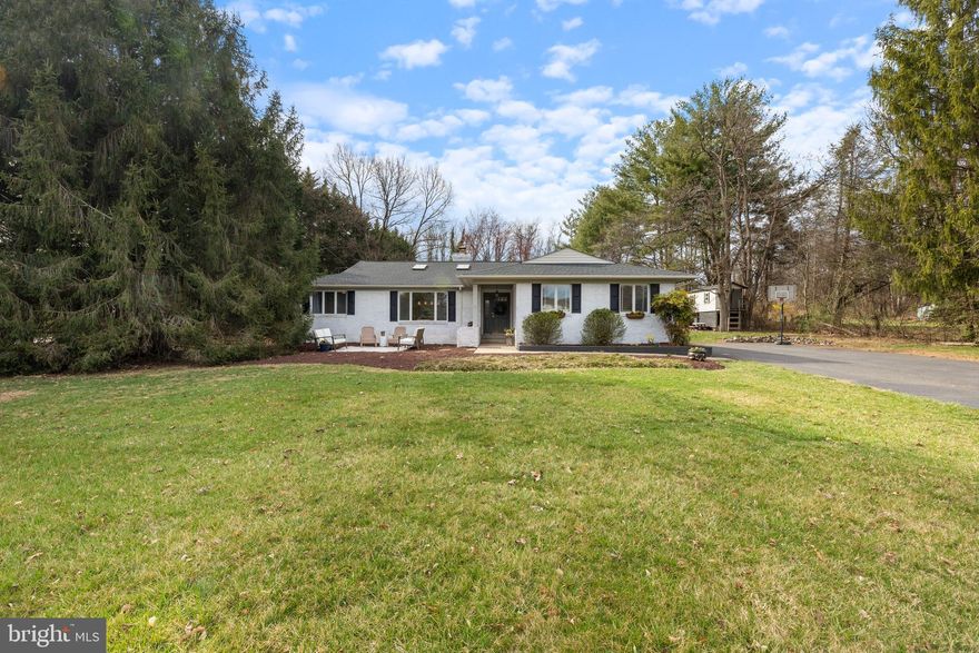 Welcome to this stunning ranch-style home, a perfect blend of comfort and modern living, nestled in a serene cul-de-sac setting. Built in 1986 and extensively renovated in 2019, this property boasts 2,783 sq. ft. of meticulously maintained space, featuring 3 spacious bedrooms and 2.5 bathrooms. The interior showcases an open floor plan, complemented by recessed lighting and skylights that flood the space with natural light. The gourmet kitchen is a chef's dream, equipped with stainless steel appliances, including a six-burner commercial range, 2 dishwashers and energy-efficient options. Enjoy meals at the kitchen island, while the adjoining dining area is perfect for entertaining. The primary suite offers a 2 closets along with a luxurious walk-in closet.  Step outside to your expansive 1.68-acre lot, where tranquility meets nature. The property backs to lush trees, while the level yard is ideal for outdoor activities. Enjoy views of the garden and surrounding greenery from your deck, perfect for morning coffee or evening gatherings. Conveniently located less than 10 miles from the airport and within close proximity to commuter lots, this home offers easy access to transportation and major routs 15, 29, 66 and 50. Additional features include a  finished basement, a brick fireplace, and ample parking with a paved driveway. This exceptional property is ready to welcome you home!