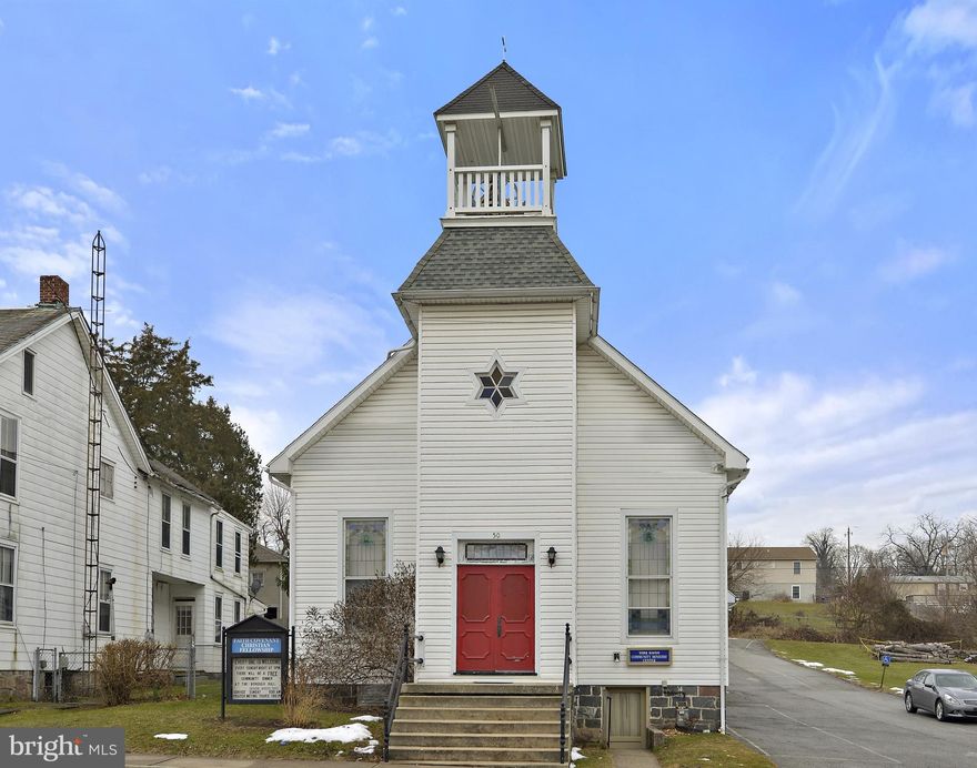 It's a rare opportunity for you and/or your congregation or organization to purchase this building which may be suited for many possible uses, including a church/daycare/community building! Contact the township for specific restrictions/requirements. Features a full basement with a kitchen & social space. Office area. Call to schedule your private showing today!
