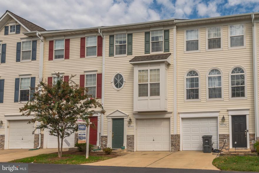 Gorgeous Three Level Townhouse style Condo proximate to the future metro and walking distance to shops and restaurants!  Open and updated kitchen with stainless steel appliances, 12x12 ceramic tile floors, center island and an awesome custom, eat-in breakfast nook.   Sliding Glass Door to Spacious Deck and Fenced-in Backyard.  Hardwood Floors through the Dining Room and Family Room.  Master Suite with lighted ceiling fan and soaring ceilings with master bath to include tile floors, upgraded vanity and fixtures.  2nd Master Suite with lighted ceiling fan and ensuite bath with updated tile floors, vanity and fixtures.   Large walk-out lower level Recreation Room!  NEW ROOF!  1-Car Garage with a full driveway for a secondary vehicle.  A lovely 2-Story Foyer complete the design of this beautiful home.   Please practice necessary Covid protocol while showing.  Limit touching and masks required.