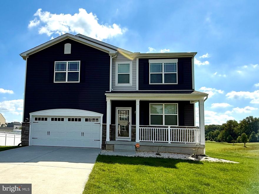 This move-in ready, 3-year-old D.R. Horton home is a spacious two-story with five bedrooms, three and a half bathrooms. It also includes a game room with a wet bar, a media room, a workshop or exercise room, a full bathroom, and plenty of storage space in the basement, as well as a two-car garage and an oversized deck. The foyer features a coat closet and creates a welcoming flow for greeting guests. The front room is filled with natural light and is large enough to accommodate both a living and dining area. The spacious kitchen boasts beautiful birch cabinetry, granite countertops, stainless steel appliances, a pantry, and an island with seating. It opens to both the breakfast area and a sizable family room. A convenient powder room is located on the first floor, and the stairs to the second floor are tucked away in the family room, which also includes a cozy fireplace. Upstairs, the owner’s suite offers a large bedroom, two walk-in closets, and an oversized ensuite bathroom. The four additional generously sized bedrooms and a hall bathroom provide ample space for everyone. The first-floor laundry room is conveniently located near the garage, along with an additional coat closet. The property is vacant and ready to move in for the holiday.