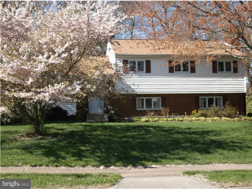 Welcome to this wonderful home that gave me a lot of fond memories. We would play ball games in our very large yard. My father had wonderful gardens. And my family would be watching us through the screened-in patio. After playing in the backyard, we would enter from the patio into a mudroom/laundry room so we would not bring anything in to the rest of the house. Afterwards we would settle in our very large family rm with a full wall brick fireplace to watch TV. There is a very clean basement where my father would use during his quiet time. We found hardwood floors just recently that were covered by carpeting. They are so nice.  Most windows are newer. Main bedroom has a full bathroom with a dressing area and a walkin closet. Newer bathroom updates and fixtures. Attic access for storage. Must see this home.