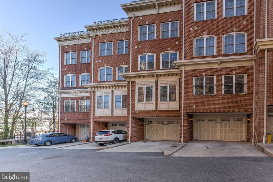 Baltimore's most luxurious townhome, in one of its most coveted neighborhoods, features a rooftop patio with spectacular views overlooking the Inner Harbor and Baltimore skyline. Enjoy the space, light, and upgrades throughout all five levels of this gorgeous home, all accessible via in-home elevator finished in wood paneling.  The first floor contains a bonus room, perfect as an office, home gym, or game room.  The expansive second floor open floor plan includes 10' ceilings and an impressive Great Room perfect for entertaining, with a powder room and space for all your family and friends.  The fully equipped eat-in kitchen contains granite countertops, 42 inch cabinets, stainless steel appliances, gas cooking and a center island.  The third floor has two bedrooms, two bathrooms, a separate laundry room, and another bonus space you can make your own.  The fourth story Master Suite features a Walk-In Closet, a spa-like bathroom with a Jacuzzi Tub, and a Wet Bar, with easy access to the rooftop patio.  Parking is always convenient, with a 2 Car Garage,  2 Car Parking Pad, and access the private parking on Belt Street reserved for Federal Place residents.  In addition to featuring sweeping views of the waterfront and skyline, the large rooftop patio has plenty of space for lounging, enjoying your favorite meals straight off the built-in gas grill, and rooftop gardening.  Whether you are enjoying a front row view of the New Year's and Fourth of July fireworks, or relaxing with a glass of wine in the evening, there is no better view.   Federal Hill is one of Baltimore's most popular neighborhoods, and you will love being steps away from many restaurants, shops, and several beautiful parks.  Truly city living at its finest!