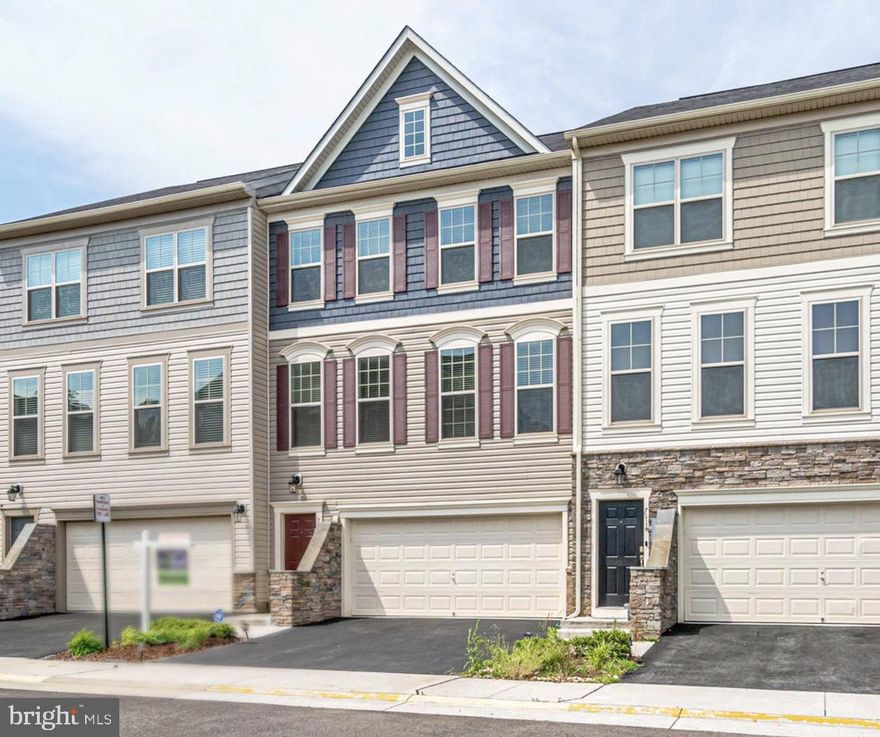 WOW! Beautiful almost new town home the size of a single family with 3 level bump-out!  Home features, hardwood floors, main level office, gourmet kitchen with granite and chocolate brown cabinets, freshly painted throughout, master bedroom with sitting room, luxury master bath, spacious rec room with 4th bedroom, full bath and more!  Home is located 5 minutes from Kingstowne, VRE and shopping, and I-95!