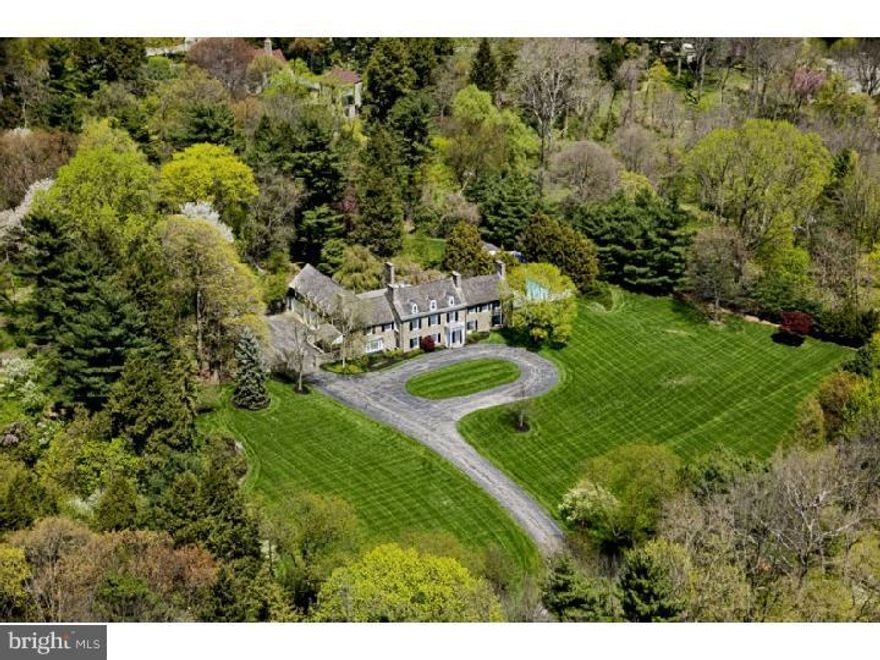 Seller will entertain offers of $4 mm plus. Linden Hall, a classic stone Colonial estate, perfectly combines Main Line architectural grandeur with luxurious amenities. The residence has recently been exquisitely expanded & meticulously renovated to reflect the floor plan and design aesthetic sought by modern families.  Old world elegance includes handsome millwork, soaring ceilings, countless French doors, lovely fireplaces and timeless fixtures. The beauty is not just in the details, but on display in every room and out of every window.  Majestically sited on over 4 acres, the estate grounds will wow you with its stone terraces, walled motor court, swimming pool, pool house and sweeping panoramic views.  Inside, highlights include grandly proportioned Living & Dining Rooms, a Gourmet Kitchen with adjacent Breakfast Room, Family Room & Study, spacious Recreation Room and breathtaking Master Retreat with His & Her closets & lavish Baths.  An exquisitely appointed Lower Level has an Exercise Room, retro-style soda fountain, Home Theater & Powder Room.