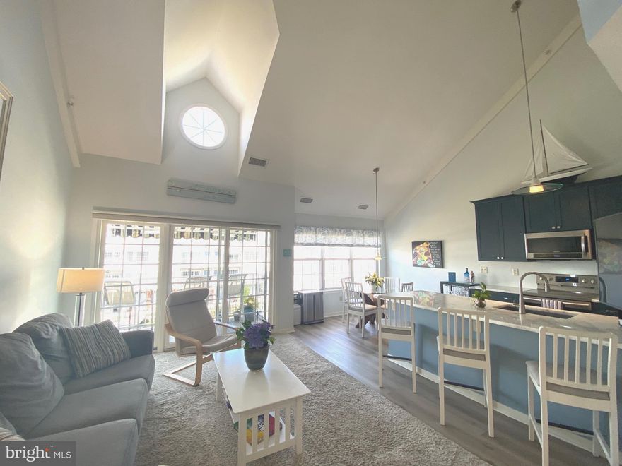 Welcome home to Canvasback Cove where the dream of waterfront living, bay views, and a private boat slip can become a reality! This penthouse condo is perfect for a second seasonal home or year-round living! Featuring cathedral ceilings throughout, two bedrooms, two bathrooms, and a spacious loft that conveniently functions as additional living space or third bedroom. The kitchen has been very nicely updated with beautiful dolomite counter tops, stainless appliances, soft close cabinetry, and under the counter beverage cooler. The large island offers a nice breakfast area with plenty of seating. There is additional seating off the kitchen with a full dining area. The three panel sliding door off the living room gives access to the lovely deck where you'll find amazing views of the water and the added benefit of admiring your own boat in the slip just below. There is stair access to the dock from the deck allowing the convenience of quickly getting to the garage, boat, and pool areas. The flooring in the living room, entry, and hall will be upgraded to LVF to match the kitchen and bathroom this September. The  primary bedroom is sure to impress with cathedral ceiling and a walk-in closet with organizational closet system. The primary bathroom has been updated and has a convenient linen closet. The second bedroom also has the cathedral ceiling with a cute loft area. This unit offers a two car tandem garage with automatic door opener and rear access to the water, docks, boat slip, and pool area with plenty of storage for the boat/pool extras. One year home warranty included! Conveniently located 45 minutes to an hour between Baltimore and Philadelphia and just minutes to I-95 and Rt. 40. Havre de Grace is full of things to do! Walk to the downtown shops, restaurants, breweries, concert venues, art galleries, antique shops, decoy museum, candy and ice cream shop, marinas, and parks. Enjoy first Fridays, Summer concerts in the park, and lots of fun festivals. Boaters will enjoy all that the Chesapeake Bay Area has to offer...waterfront restaurants, anchoring beaches, and beautiful sunsets on the water. Come take a look and see why Havre de Grace has become a highly desired place to call home.