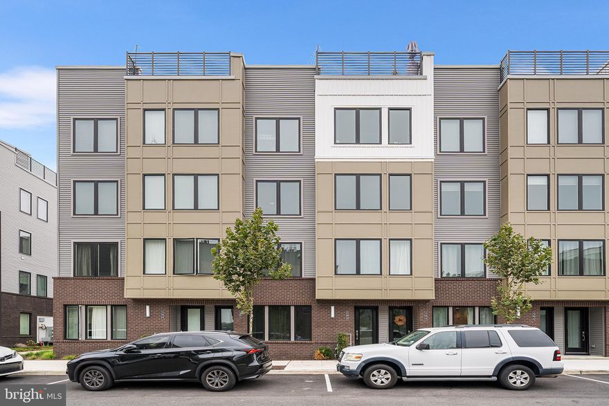 Move-in ready Northbank gem! Freshly painted with 9 years of tax abatement—just unpack and start enjoying your new home. This like-new apartment in the elegant Northbank community is the home you’ve been waiting for! Nestled along the Delaware River, Northbank offers access to scenic park areas and biking/running paths along Columbus Boulevard, with easy access to I-95 for quick commutes around the city. It’s no wonder residents love calling Northbank home. This unit is packed with thoughtful upgrades including custom cabinets, modern appliances, bedroom ceiling fans, tinted windows for privacy and energy efficiency, and even an EV charger in the garage. Inside, you’re welcomed by a bright, open-concept living and dining area. The kitchen offers generous counter space and a large island—perfect for morning coffee or casual entertaining. The living room feels cozy, with added privacy from the tinted windows. A convenient half bath and garage access complete the first floor. Upstairs, you’ll find three spacious bedrooms with abundant natural light. The two front bedrooms share a stylish full bath, while the upstairs laundry makes chores easy. The primary suite impresses with its own outdoor space, a large ensuite bath, and plenty of room to unwind. For when you’re well-rested and ready to go out, you’re just a short walk to downtown Fishtown, home to some of Philly’s hottest restaurants, cafés, and cocktail lounges—including La Colombe, Suraya, Kalaya, Two Robbers, Bastia at Anna & Bel, with many more to explore.  Bright, spacious, and part of a thriving riverfront community, this home brings Philly living to the next level.