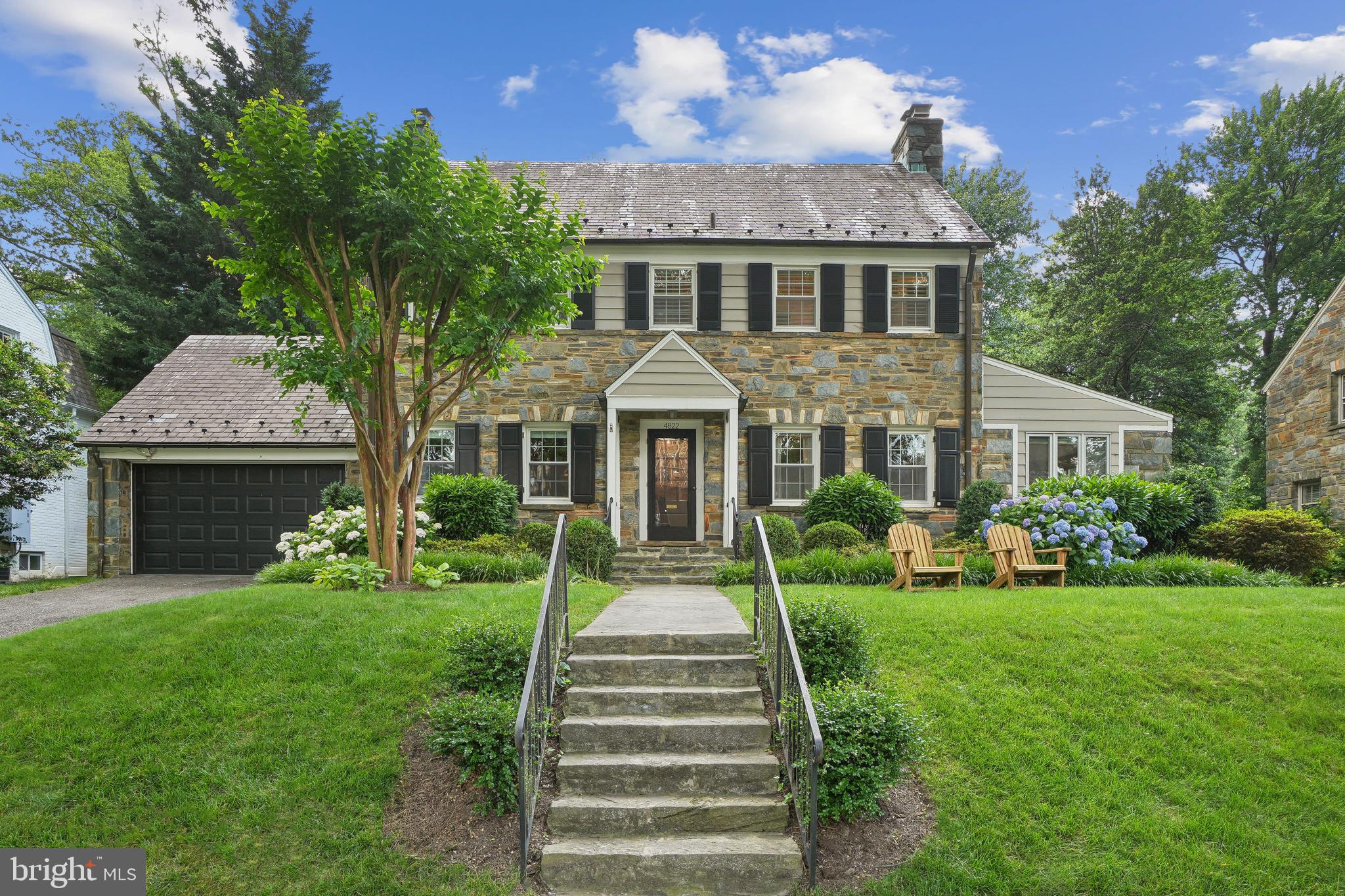Classic Spring Valley all stone center hall colonial prominently located on Rodman Street. This stunning and traditional home has been continually updated by the current owners and features new windows throughout, an expansive two story addition with large updated eat-in kitchen, direct access covered porch and an expanded owners bedroom suite with walk-in closet and enlarged bathroom. 2 additional and spacious bedrooms with their own individual bathrooms and a mixed use 4th floor create ample space and accommodations for guests. The lower level features a recreation room and in-law bedroom with a private bath and separate rear yard access. The large level yard has plenty of square footage for outdoor entertaining/play and a two car garage completes the offering.
