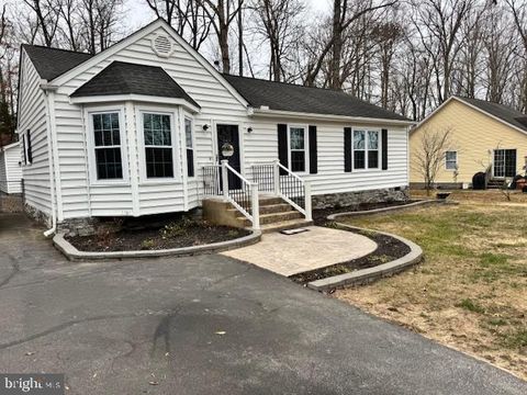 210 REMINGTON DRIVE RUTHER GLEN VA 22546