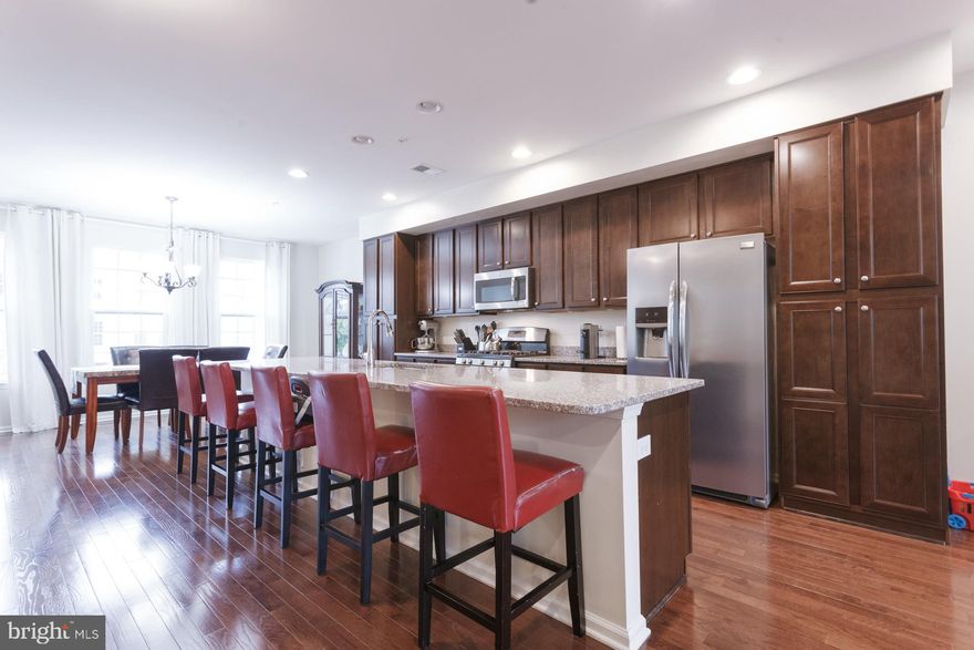 WOW! Check out this gorgeous home located in the sought-after Big Oaks Crossing section of Langhorne in the Neshaminy School District. The home sits back in a quiet and private community just minutes away from major highways and shopping. As soon as you walk in you will notice all the amazing features this home has to offer. The main level of the home is perfect for entertaining. The kitchen features granite countertops, tons of cabinet space, and a kitchen island that doubles as a great breakfast bar. The living room has hardwood floors and recessed lighting throughout. You will love all the natural light this home has to offer that partly comes from the back sliding glass door that leads you out to your own private oasis on the large deck that overlooks the backyard. The second level features a master bedroom with an oversized walk in closet and en suite master bathroom, with a separate toilet room, tile show,er and dual vanity. On the same floor, you will notice the two additional bedrooms that are spacious with their own closet space and a separate laundry room. The bottom floor features large windows, a sliding door to the back yard and great storage opportunities are just a few of the great items it has to offer. In addition, this home has a 2 car garage plus 4 car driveway parking.