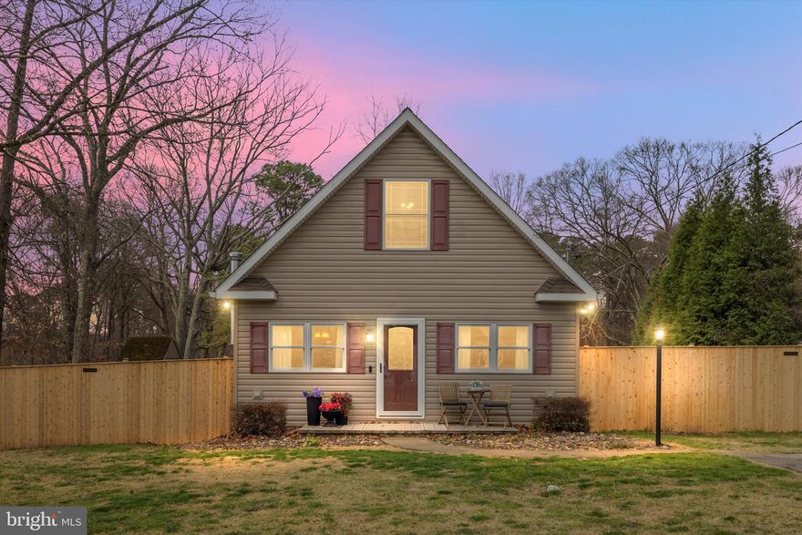 Charming three bedroom, two bath single-family home in the desirable Elvaton Acres neighborhood of Millersville! Situated on 1.03 acres, this property offers over 2,200 total square feet, plenty of parking, and a spacious, open yard perfect for entertaining. Features include hardwood flooring, a cozy living area with pellet stove, updated kitchen, and new utility room flooring, along with Andersen windows and recessed lighting. Flexible layout with a main-level bedroom and full bath, plus a bonus room ideal for an office or additional living space.Lower level offers extra storage and workspace with a separate entrance. Enjoy the private backyard with paver patio and firepit. Conveniently located near shopping, dining, and major routes.