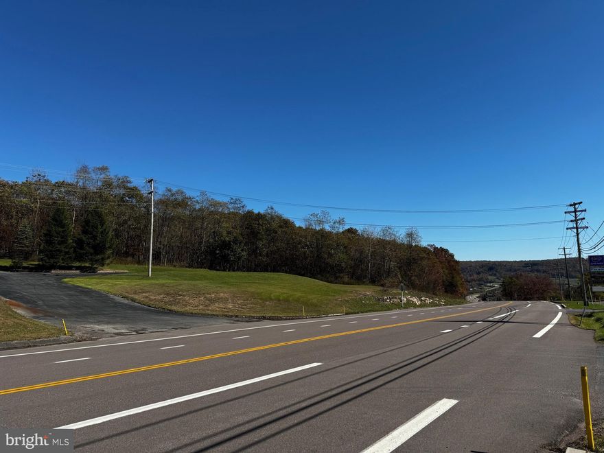 RARE property alert! Don't miss a chance at the endless opportunities this property has to offer. Prime location in immediate Deep Creek Lake & WISP ski resort area for business, development, or personal use & enjoyment.  Enjoy easy access to all of the surrounding businesses, restaurants, recreation, and amenities.  8.32 acres, town center zoning, public sewer available, 500' Rt. 219 (Garrett Highway) road frontage PLUS Deep Creek Lake & Wisp Ski Slope views are just some of the great qualities this property has to offer. The possibilities of usage are as big as you can dream. Call today to see this once in a lifetime property! There are no buildings/improvements on property or any that convey.