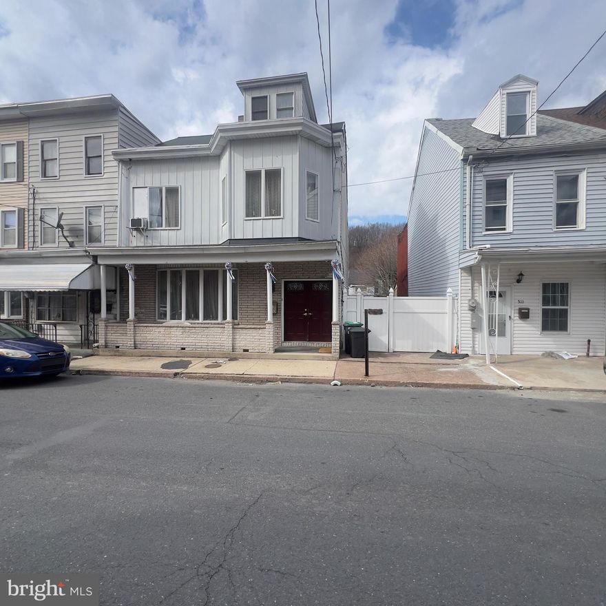 This 4-bedroom, 2-bathroom semi-detached home offers over 3,000 sq. ft. of living space, plus a full unfinished basement for added potential. Featuring a front porch, back and side deck, and a solid structure, this home is ready for your vision. It needs a thorough clean-out but is a fantastic investment opportunity—perfect for a flip, rental, or owner-occupant looking to build equity. Conveniently located between Harrisburg, Allentown, and Wilkes-Barre/Scranton, it's ideal for commuters. Don't miss out on this diamond in the rough!

Note: The sale includes this parcel and 3 adjacent vacant parcels: 
507 E Pine (Tax ID: 48-05-0232)
E Pine (Tax ID: 48-05-0236)
504 E Market (Tax ID: 48-05-0233)
E Market (Tax ID: 48-05-0234)