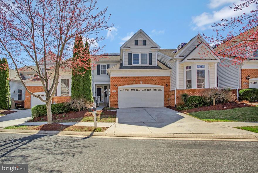 Welcome home to conveniently located Hidden Bluff HOA and this elegant townhome that boasts over 2926 sq. ft, beautiful profile moldings, tall ceilings and a comfy loft. An inviting entry foyer welcomes you and introduces this fine home featuring a formal open dining room with custom moldings that flow into a living room complimented by an ambient fireplace, a 2-story vaulted ceiling, skylights, gorgeous built-ins and a new deck. The chef ready eat-in kitchen presents raised panel white cabinetry, stainless steel appliances, sleek granite counters, and a breakfast table corner with tall double windows.  Allowing more entertainment space is the finished lower level highlighted by a rec room with a walkout, a games area, wet bar, an open bonus room, a bedroom, a full bath, and extra storage space.


 this