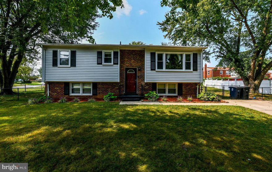 Lovely split foyer, renovated in 2017, features 4Br/3Ba*stainless steel appliances*granite countertops*hardwood floors*newer windows*new lighting* fresh paint*updated kitchen and baths*chair rail molding* fresh paint*new doors*washer/dryer*4th bedroom in basement w/full bath* Large yard  with fire pit and deck* and 2-car driveway. Home sold as-is but in great condition. Home warranty available.