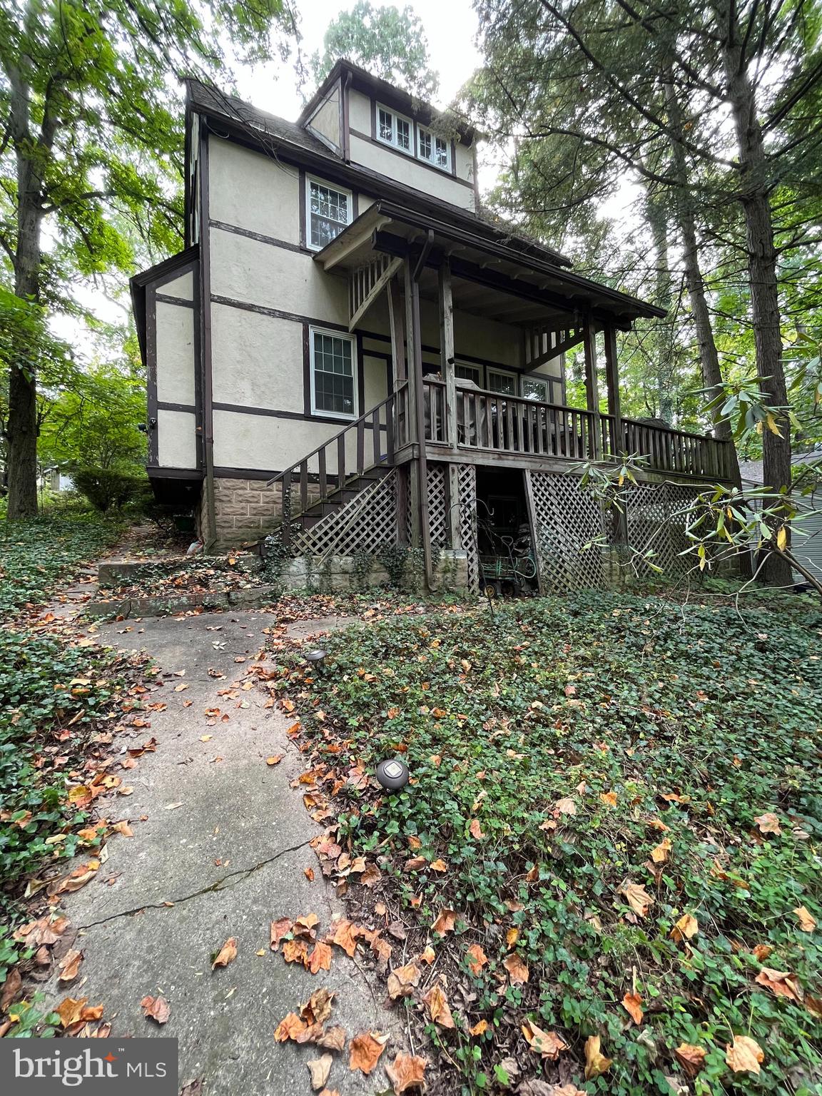 Investor Special in highly desirable Takoma Park! This spacious 4 bed, 2 bath Tudor sits on an oversized, quiet lot with private driveway parking and an unfinished basement—ideal for expanding square footage and boosting value. Surrounded by mature trees and nestled along scenic Sligo Creek Parkway, this property offers the rare combination of privacy and proximity to Metro, shopping, and commuter routes. Renovated homes in this neighborhood command top dollar—unlock the potential and bring this gem back to life. Incredible opportunity in one of Montgomery County’s hottest markets!