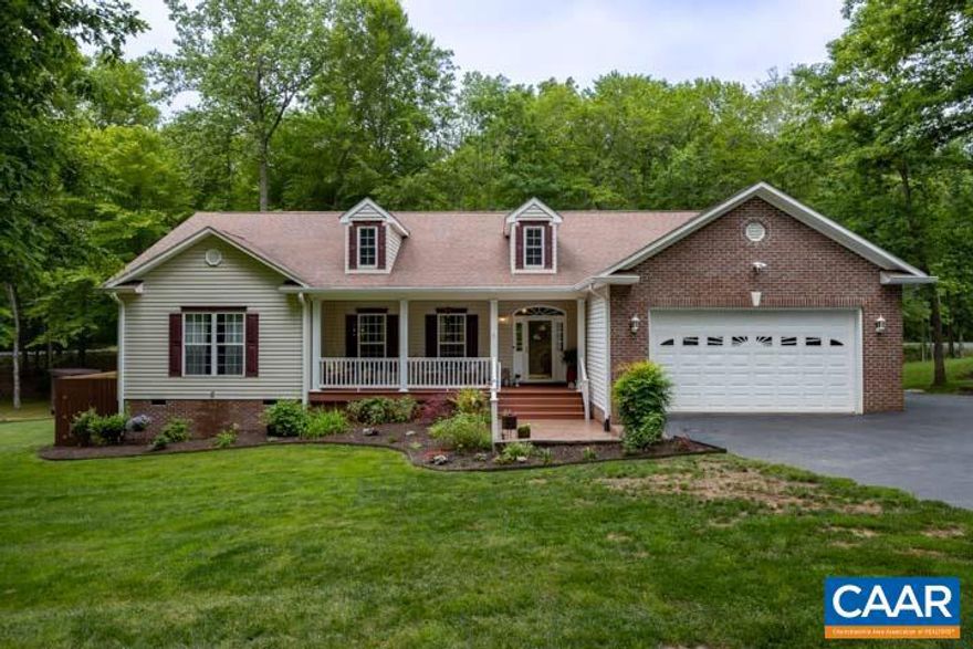 Welcome to your dream home! Tucked in on a beautiful .86-acre lot in the desirable Shenandoah Crossing community in Gordonsville, this charming residence offers a spacious retreat for those seeking comfort, style, and a touch of nature. Upon entering, you'll be greeted by an inviting living area that exudes warmth and coziness. Natural light cascades through large windows, illuminating the open floor plan that seamlessly connects the living room, dining area, and kitchen. The well-designed layout provides an ideal space for both relaxation and entertaining guests. Retreat to the master suite, a private sanctuary where you can unwind after a long day. With its well-appointed en-suite bathroom, featuring a luxurious soaking tub and a separate shower, you can indulge in moments of tranquility and pampering. The backyard and deck provide outdoor living space that is perfect for entertaining, including an outdoor sink with hot water access, well manicured landscaping, ample seating areas and a firepit area with lighting.  The community offers a slew of amenities including a 60 acre private lake with boat launch, tennis courts, playgrounds, picnic areas, multiple pools both indoor and outdoor, hiking trails, disc golf course and more.,Granite Counter