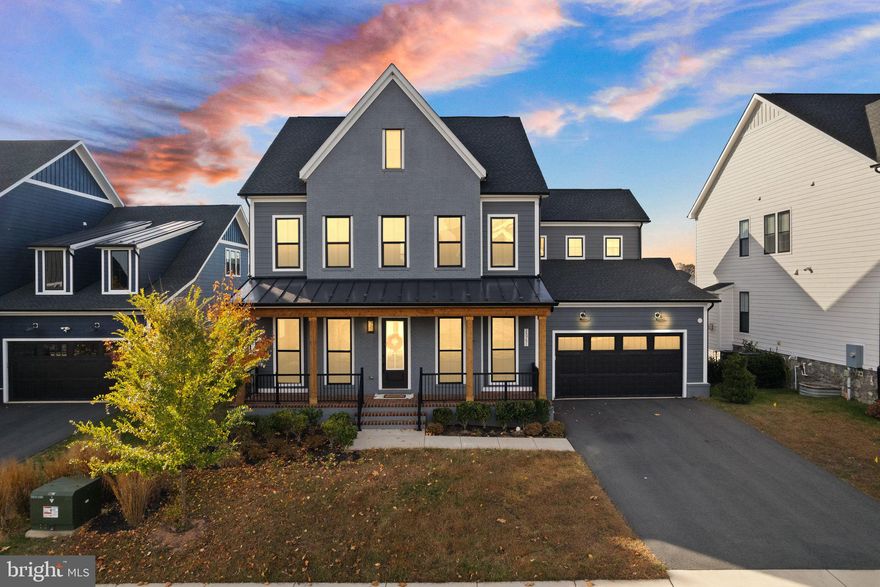 Welcome to this stunning east-facing Colonial in Hartland, one of Loudoun County’s premier master-planned communities. Built in 2021 and filled with upgrades, this luxury Aldie home for sale offers nearly 6 bedrooms, and 5.5 bathrooms across three finished levels.

The main level features an open-concept floor plan with wide-plank luxury vinyl floors, a gourmet kitchen with quartz countertops, premium cabinetry, and stainless steel appliances. The spacious family room with fireplace flows into the morning room extension and out to a new Trex deck that is perfect for entertaining or relaxing. A main-level bedroom with ensuite bath and a half bath add flexibility for guests or multi-generational living.

Upstairs, the primary suite feels like a retreat with a tray ceiling, dual walk-in closets, and a spa-style bathroom with a soaking tub and large shower. You’ll also find a guest suite with private bath, two bedrooms with a Jack-and-Jill bath, and a laundry room on the upper level. The finished basement includes a recreation room, bedroom, full bath, and unfinished storage area ideal for a home gym or media room.

Residents love Hartland’s resort-style amenities, including the Hartland House community center, fitness studio, pool and splash pad, tennis and basketball courts, and walking trails. Whether you enjoy yoga, swimming, or neighborhood events, Hartland makes it easy to stay active and connected.

With its east-facing orientation, abundant natural light, and modern design, this home offers luxury living in one of Aldie’s most desirable neighborhoods. It is close to top-rated Loudoun County schools, wineries, shopping, and major commuter routes.

This home delivers the best of newer construction, modern amenities, and community living. This is a rare opportunity to own a move-in ready home in Hartland.