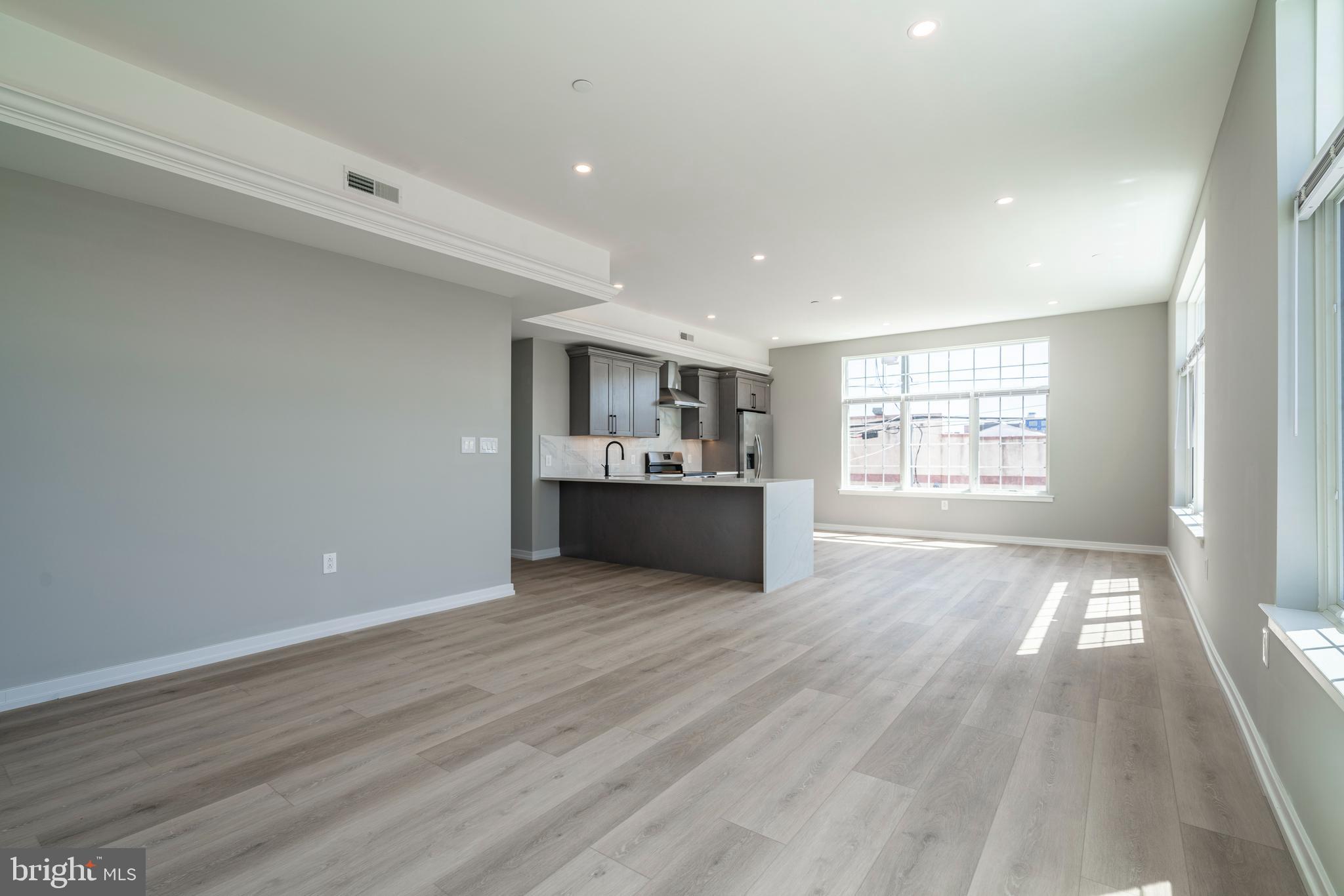 CURRENTLY OFFERING TWO MONTH'S RENT FREE FOR LEASES BEGINNING IN JANUARY 2025 AND EXTENDING TO SPRING/SUMMER 2026
Welcome to Innovator Village, nestled in the heart of Graduate Hospital! This gated community is home to 82 brand new construction, luxury units featuring top of the line finishes. 2401 Washington Ave offers everything you could desire in a city apartment and can be moved into as soon as April 1st. This corner unit features a spacious, open living room with huge south-facing windows and lovely natural light, a kitchen with quartz countertops and stainless steel appliances, three bedrooms, two beautiful bathrooms, hardwood floors and an in unit washer/dryer. The building also features an amenity room, elevator, beautiful brick exterior, and shared roof deck with fantastic views of Center City. Innovator Village is located on the bustling Washington Ave corridor with easy access to Drexel University, CHOP, Penn University, I76, restaurants, shops, public transportation and much more! On site parking is available for lease for $300/month (currently all rented, but spots likely opening up this summer).