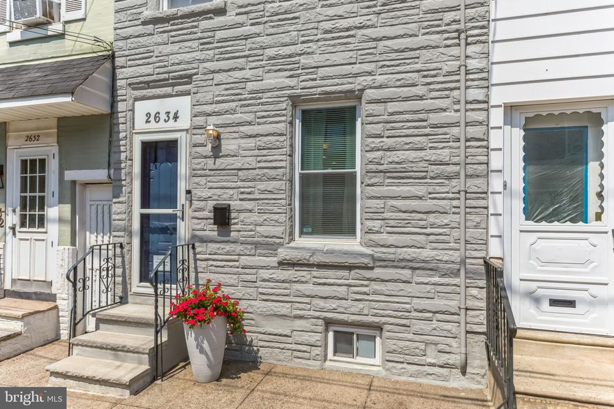 Welcome to 2634 E. Thompson Street, a charming 2-story row home in the Fishtown area featuring 2 bedrooms and 1.5 bathrooms.

Inside, you'll find lovely wood flooring throughout, creating an inviting and open feel. The main floor seamlessly connects the living room to the kitchen, making it a great space for hanging out with friends and family.

The kitchen is a standout, equipped with modern stainless-steel appliances, granite countertops, and a kitchen island. The backyard is a true gem, featuring a wood deck and yard - the perfect for outdoor gatherings.

Upstairs, there are two well-sized bedrooms, both with ceiling fans and decent closet space. The bathroom has been recently updated and offers a shower/tub combo.

Downstairs, the basement has been converted into an office space with a convenient powder room and laundry room. Storage is no problem with a large closet under the stairs.

An added convenience is the clean breezeway that provides direct access from the backyard to the front street, simplifying trash and recycling.

2634 E. Thompson Street is well-connected to major roads and public transportation. You can easily walk to popular dining spots like Tacconelli's Pizza, Memphis Taproom, and more. Plus, parks like Aramingo Square and Cione Playground are nearby, and Penn Treaty is just a short distance away. Don't miss this opportunity to rent a cozy home in lively Fishtown!