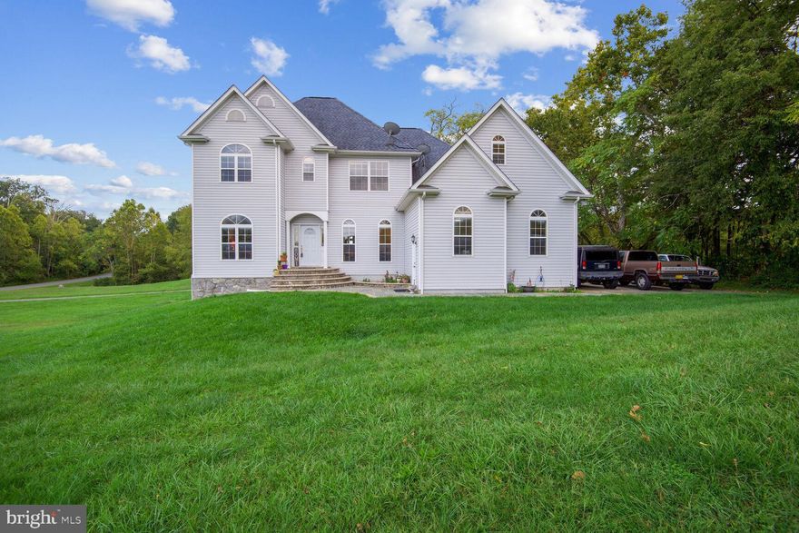 Desirable Stepney Plantation Estates! Move in Ready! Original Owner. Engineer by trade. Amazing... Custom Built Home.  4 Bedroom & 3 Bath Colonial on 3.84 acres.  Close to 2500 Finished Square Feet! Perfect for DIYer who either Enjoys Working in the Yard or as a Shady Tree Mechanic. Your new property offers plenty of space to park or store your Boat, RV, etc. Boasting an Over-Sized 3 Car Garage with Additional Storage in Garage and Attic. Enjoy views from your Front Door, Large Deck off the Family Room, Balcony from your Master Suite and/or Flag Stone Patio all while Backing to Trees. Ideal for anyone who Enjoys Entertaining and the Good Life! This Sun Light Filled Home offers Hardwood Floors, Palladium Windows, Large Foyer which opens up to your New Family Room with a Cozy Fireplace & Mantel. Enjoy views of your yard and Pond from either your Large Trex Deck located off the Family Room or your Master Suite Balcony. Kitchen with Tile Floors, Tile Backsplash, Granite Counters and Large Walk-in Pantry. Spacious Master Suite Boasts Tray Ceiling, Sitting Area, Luxury En-Suite Bath with Separate Oversized Tiled Glass Enclosed Shower, Large Jacuzzi Soaking Tub, Dual Vanity, Granite Countertops, Tile Floor along and very Spacious Walk-in closet. Access from either the Master or Hallway is a bedroom and/or great room perfect for an Office or Recreation Room for any member of the family. Walkout Unfinished Basement Boasting Full Size Windows, Tons of Natural Light, rough in for another Full Bath, possibilities of another Bedroom, Recreation Room including Large Sliding Glass Door out to your Flag Stone Patio.  Additional perimeter lighting around the entire home including small accent spotlighting over the 3 Car Garage doors and deck. Close to everything… Shopping, Restaurants, Downtown Historical Manassas, Bull Run Regional Park. Minutes to all Major Routes including 66/29/234/15 & VRE. What else could you ask for and/or want in a home?! This one will not last long! Your new home awaits! Ask your Agent Now to Preview it for yourself!