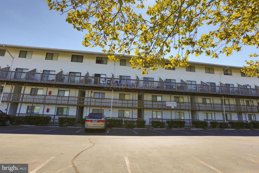 North Ocean City condo includes a deeded boat slip. This 1 bedroom 1 bath comes fully furnished and just a short walk to the beach and Northside park. Updated kitchen with solid surface counter. Laminate flooring, newer sliding door, stack washer/dryer and 3 ceiling fans. Very bright and large bedroom with 2 queen size beds with plenty of closet space. Enjoy the views of the canal from your balcony or spend the day at the pool. Building is self managed with low condo fees. Home Warranty being offered to buyer.