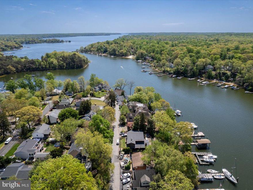 Open  House  Saturday (9/20) 2pm -4pm.  Come on out and see this wonderful home & the beautiful views of the Severn River!   Beautiful Coastal WATERFRONT HOME, minutes from Annapolis, MD.  Over 4,000 sq. ft. of living space and over 3,400 sq. ft. of Deck Area looking at the Beautiful Water views of the Severn River! Sellers say bring all offers!
LOOKING for a waterfront home?  LOOKING for an in-law suite?  LOOKING for a home located in a BLUE-RIBBON SCHOOL district?   Then you may want to see this one!   Welcome to your dream waterfront home nestled on the banks of the majestic Severn River.  Located within 2 miles of Severna Park High, a Blue Ribbon High School.  This exceptional property offers an unparalleled lifestyle where every day feels like a vacation. Boasting a private dock capable of accommodating up to 7 boats, including sailboats, and a remarkable mean low water of 15 ft., this home is a boater's paradise. As you approach the residence, the allure of its expansive decks spanning three levels captivates you, providing ample space for entertainment while offering breathtaking views of the serene river. A traction elevator effortlessly transports you to the lower deck and riverfront, ensuring convenience and accessibility. Stepping inside, the grandeur continues with a dramatic staircase leading to a living room adorned with 2-story ceilings, beautiful wood accents, and 5 skylights that bathe the space in natural light. The water-facing dining/game room features a built-in bar and panoramic windows, seamlessly blending indoor and outdoor living. The gourmet kitchen is a chef's delight, featuring high-end cabinets, countertops, and appliances including a Sub-zero refrigerator. A cozy family room and breakfast nook offer a relaxed atmosphere, complemented by a wood-burning fireplace for chilly evenings. The main level also houses a primary suite with a luxurious bathroom, a second bedroom, and a convenient butler's pantry for extra storage. Upstairs, a spacious office with custom cabinets and a pull-out desk awaits, alongside a second primary suite boasting dual walk-in closets, a spa-like bathroom, and a private balcony overlooking the river. Additional amenities include a laundry room with a cedar closet, perfect for storage, and an in-law suite/apartment on the lower level with a separate entrance and parking. The apartment features a fully equipped kitchen, ceramic tile flooring, a cozy bedroom, a full bathroom, and a living/dining area with mesmerizing water views. This remarkable property offers not just a home but a lifestyle, where luxury meets tranquility and every day brings a new opportunity to savor the beauty of waterfront living. Don't miss your chance to own this waterfront gem in Severna Park. Schedule your private tour today and make this your forever retreat!  Schedule your private tour today and make this your forever retreat!