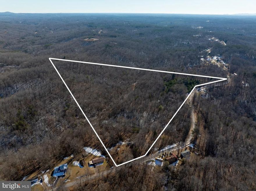 31.6 Acre Residential Lot on Rock Hill Community Road. This beautiful wooded tract is located in the Rock 
Hill Community near Bassett in Henry County. The property features mature trees that provide a serene 
and natural setting, making it a true escape into nature. The rolling hills add character and elevation to the 
landscape, creating a picturesque environment that is both peaceful and inviting. And it’s only 20 minutes 
from Martinsville and Fairy Stone State Park! Whether you're looking to build your dream home or seeking 
a retreat for outdoor activities, this property has everything you need.
