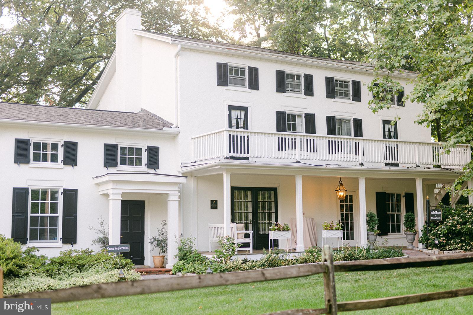 The Award Winning, iconic and highly rated Fairville Inn Bed and Breakfast is now for sale. This landmark property is located in the heart of Chadds Ford and includes the Main House dating from the early 1800s, as well as the Springhouse and Carriage House. The Main House is a contributing building in the Fairville Historic District. The owners have conducted a complete makeover of the property, transforming it into a stylish retreat and thriving business ready for the next owner. The property features a total of 10 guest rooms, each tastefully decorated. The Carriage House offers four rooms and two suites, each with a private deck overlooking the gardens. The Springhouse has four rooms, each with a deck and a panoramic view down the meadow to the neighboring pond. Eight of the rooms have gas fireplaces. The Main House features the guest reception area, a living room with a gas fireplace, an after-hours sitting room, a dining room and a commercial kitchen. There is also a commercial laundry and storage area located on the lower level of the Carriage House. The Main House also has the potential to add up to 5 more rooms, which would further drive revenue. One room has already been beautifully renovated to show the potential. Alternatively, the second level of the Main House could be easily converted into the Innkeepers residence. At present, there is parking for up to 25 cars, with the parking potential on the 2 acre property. Check the Village Commercial Zoning for additional revenue potential, including the possibility for a restaurant in the Main House. The Inn is just minutes from world-class venues including Longwood Gardens, the Winterthur Estate and Gardens, the Brandywine River Museum, Terrain and many more in nearby Kennett Square, West Chester and Wilmington. Showings by appointment only. Listing agent must accompany all showings.