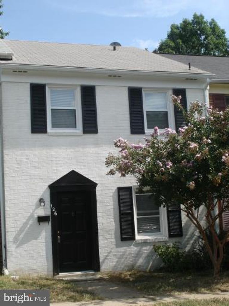 3 level 3 bedroom townhouse with brick front. House has been rented and is now  in process of being renovated - painted throughout, new plank vinyl flooring on first level and new carpet upstairs.  All windows,   kitchen cabinets and bath fixtures have been replaced. Finished family room with half bath on lower level. Sliding glass doors from basement to fenced yard. Conveniently located to schools, shopping, VRE, and commuter lots.