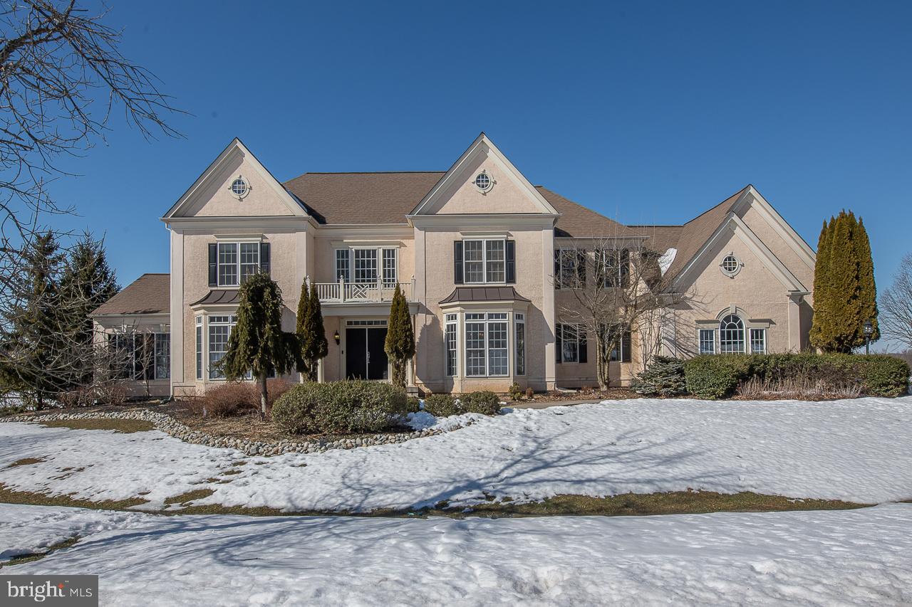 Welcome to one of the finest homes in Chester County complete with all the amenities sure to meet the most discerning buyer's needs! Work, learn and play! Two home offices and plenty of space! Located on one and one half acres in the Deerfield community this spectacular home backs to acres of open conservancy land with breathtaking views reminiscent of Napa Valley. Current owner had the entire home professionally painted and installed new hardwood floors in the lower level and family room. Enter into a two story foyer leading to the formal dining room and a formal living room that leads to the versatile Conservatory/Sunroom where you can spend winter days soaking in the warm sunlight or welcoming summer guests. The first floor continues with a private executive home office with hardwood floors, elegant powder room and a two story family room with floor to ceiling windows, stone fireplace improved by the current owner. Adjacent to the family room is the ultimate Chef's Gourmet Kitchen complete with coffee bar, new Bosch dishwasher, Bosch 5 burner gas cooktop, double wall ovens, GE monogram refrigerator, expansive center island and oversized breakfast room. Laundry with LG front load washer and dryer is conveniently located off the kitchen that leads to the oversized four car garage. Access the Trex deck off the kitchen for outdoor entertaining while taking in the endless vista. Upstairs you will find four large bedrooms including a master en -suite with a fireplace, sitting area, electric black out shades, spectacular bathroom with tub and shower, his and her sinks and one of many walk in closets. All bedrooms have a private bath! You will fall in love with the Princess Closet just outside the master bedroom, keep as is or easily convert it back to a bedroom. Hardwood floors throughout the second level. On to the lower level...here you will find state of the art and recently updated media room with 90” TV and brand new reclining media chairs as well as new carpet. Step up to the full bar for libation during intermission or, choose a favorite wine from your temperature controlled personal wine cellar recently upgraded by the current owner. Guests will have the option of taking up quarters in their own private en suite in this lower level just beyond the wine cellar then waking to the gym for a morning workout, then step outside the walk out basement to the beautiful hard-scaped backyard patio to enjoy the views. An additional custom home office is located on the lower level. Upgraded landscaping was recently completed. Conveniently located to major highway, public transportation and award winning Great Valley Schools. Please see documents for current owners improvements and upgrades.