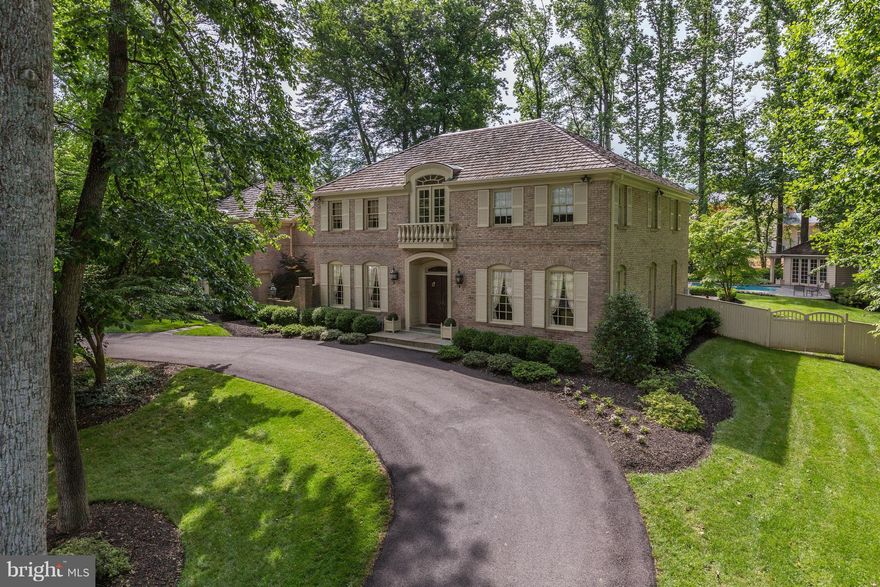 PRICE REDUCED! Exceptional home completely renovated, redesigned and enlarged. Gourmet kitchen with cozy fireplace, amazing oversized master suite with fireplace, sitting area, exercise room, and master bath with shower & whirlpool tub. Fabulous outdoor entertainment area with multiple patios, pool & pool house, extensive professional landscaping & outdoor lighting! All in close in Potomac!