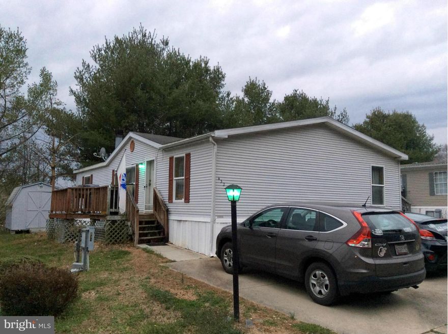 GREAT LOCATION NICEST PARK IN ANNE ARUNDEL, POOL, TENNIS, EXTRA PARKING, STORAGE. WELL MAINTAINED DOUBLE WIDE, WILL HAVE NEW CARPET INSTALLED, PRESSURE WASHING. MOTIVATED SELLERS FOUND HOME OF CHOICE.  I HAVE LENDERS NAME FOR FINANCING.   PRICED TO SELL, PLACED ACROSS FROM LARGE GROUP OF PINE TREES, VERY LITTLE TRAFFIC, SIDEWALKS AND MATURE TREES. STORAGE SHED