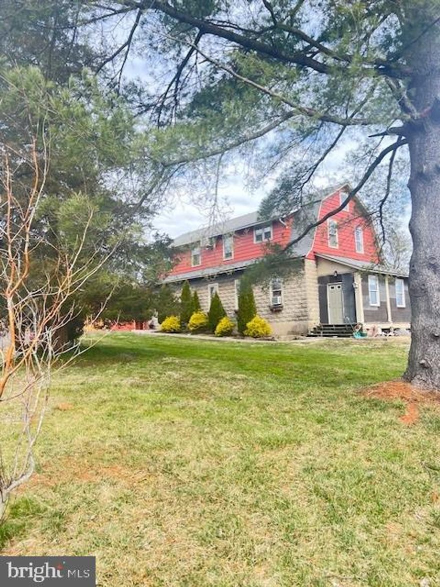 Endless possibilities!  This unique property includes two parcels totaling .59 acres in a prime Bucks County location.  The site, currently configured for an auto detailing business is comprised of multiple buildings.  The main building consists of an oversized (4-car) heated garage with a powder room and a charming apartment above.  The living space with hardwood floors throughout has been updated with a newer kitchen and a remodeled tiled bathroom with a walk-in shower for a comfortable place to call home. There are two additional outbuildings including a 4-car garage/barn building and a masonry garage with an office.  So many options!  Please contact Plumstead Township to verify your desired use.