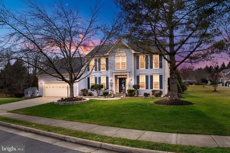 Stunning three-level colonial with extensive updates throughout. Enter into a two-level foyer with two coat closets, a formal living room, and dining room. The separate office area is a legal 6th bedroom, and there's a remodeled half bath. The top-of-the-line renovated eat-in kitchen includes custom cabinets, a Sub Zero side-by-side freezer and refrigerator, induction cooktop, double wall oven, and many other attention-to-detail upgrades for a gourmet cook. The fabulous family room with a wood-burning fireplace and built-in shelving leads to extensive outdoor areas, including a large deck and multiple patios, perfect for entertaining.

The home has 5/6 legal bedrooms, with four upper-level bedrooms, including a huge primary bedroom with vaulted ceilings and a large en-suite bathroom with a double vanity sink, separate shower, soaking tub, a large walk-in closet, and a separate toilet room.

The lower level has been completely remodeled with a den/office, legal bedroom, recreation room with a wet bar and French doors leading to the side yard, a built-out laundry room (there is also a washer/dryer hookup on the main level), a sewing craft area, extensive storage, and a huge remodeled bathroom with a separate shower and soaking tub.

Other updates include a whole-house generator, replaced double-pane windows and siding, a new furnace, tankless water heater, new carpet, freshly painted walls, and a replaced roof. The beautiful yard features extensive landscaping and hardscaping, a 12 x 16 shed, a flat grassy yard, and an oversized two-car garage. So many updates throughout!