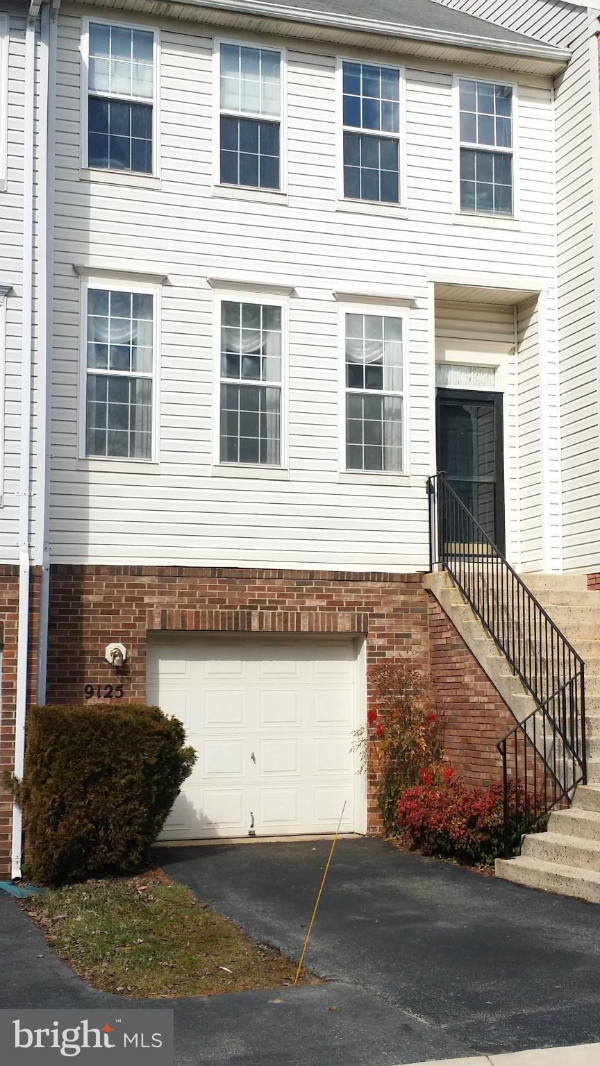 Garage TH w/ 3 bdrms, 2 full & 2 half baths, large gourmet eat-in kit with center island, Quarts counters, stainless steel appls & a sitting area that opens up the deck & private wooded back yard, brand new hardwood flrs in living & dining rooms, owners retreat w/ super bath w/ soaking tub, dual sinks & walk in closet, spacious 2nd & 3rd bedrooms, finished walkout lower level. 24hr Notice Required