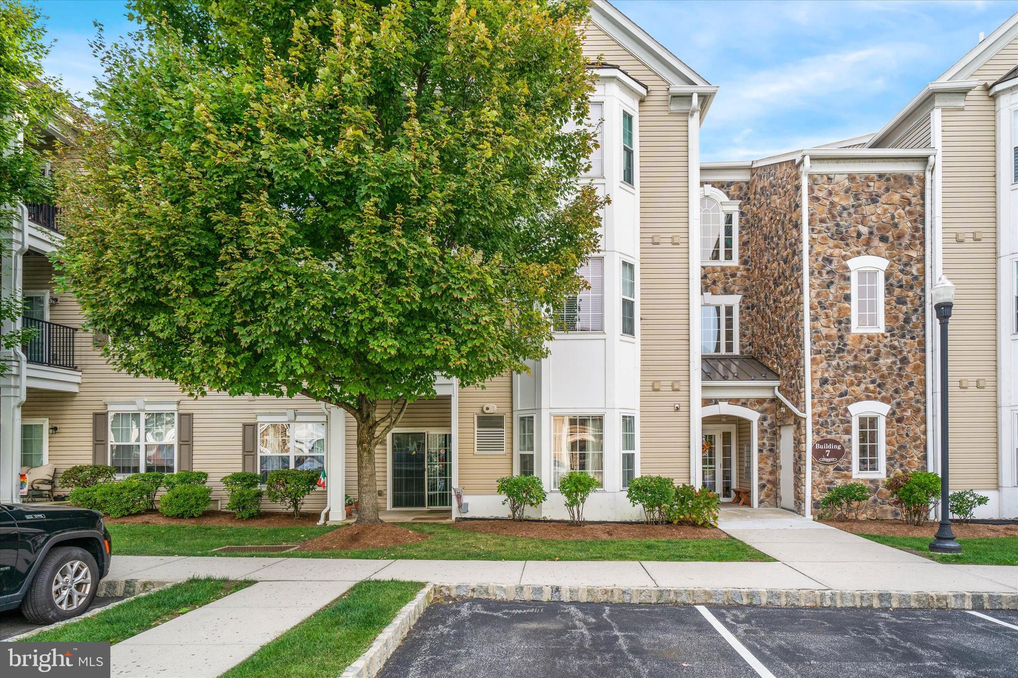 Welcome to Traditions at Ridley Creek! Bright and spacious 2 bedroom, 2 bath unit with den is freshly painted and has been newly carpeted. This over 55 established community offers 1 designated parking space and storage locker located in building 11. Enjoy the Club House activities to include: fitness room, game room, library, fireplace, full kitchen and an outdoor covered area for entertainment. Conveniently located to the Philadelphia Airport, all major highways, railways and sports and entertainment venues. Monthly fee of $310 includes all grounds fee and common area maintenance, exterior building maintenance, health club, insurance, lawn maintenance, management, sewer, snow removal, trash, water, club house, exercise room, game room, library, party room, assigned parking. There is a $1000 capital contribution at closing.