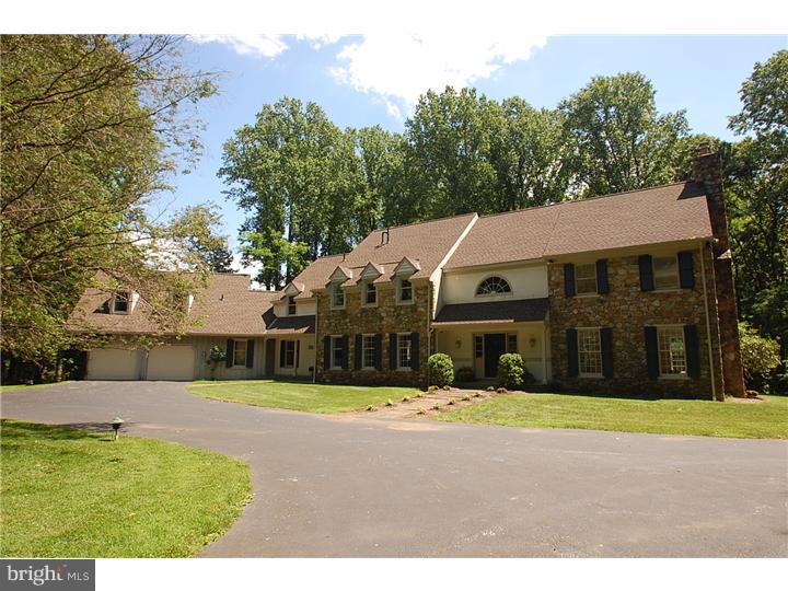You will be the master of all you survey as you view the 4 woodland acres surrounding this secluded Pennsylvania Colonial Farmhouse. Exquisite Moldings and Wood Beam accents are evident throughout. Refinished Random-Width hardwood floors, Deep Window Sills, French Doors, 3 Fireplaces, abundant Built-ins and a Skylit Reading Nook are just a few of the amenities that add to the charm of this unique and private property. The sunny Kitchen is complete with granite countertops, stainless steel appliances, Breakfast Room, and newly updated Laundry & large mud-room area. A spacious Game Room/Office, Family Room, Formal Living Room and Dining Room along with 2 newly updated powder rooms complete the first floor. The Master Suite is a true retreat with a fireplace flanked by built-ins and a Marble Bath with separate stall shower and soaking tub. The Au-Pair/In-Law Suite above the attached oversized two car garage, with private entrance on opposite side of main quarters includes a kitchenette as well as individual HVAC system. Close to schools, shops and transportation. Who wouldn't want to own this private oasis in the middle of Easttown Township? Close to everything!