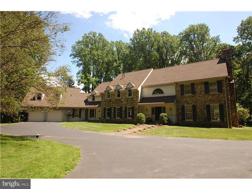 You will be the master of all you survey as you view the 4 woodland acres surrounding this secluded Pennsylvania Colonial Farmhouse. Exquisite Moldings and Wood Beam accents are evident throughout.  Refinished Random-Width hardwood floors, Deep Window Sills, French Doors, 3 Fireplaces, abundant Built-ins and a Skylit Reading Nook are just a few of the amenities that add to the charm of this unique and private property. The sunny Kitchen is complete with granite countertops, stainless steel appliances, Breakfast Room, and newly updated Laundry & large mud-room area. A spacious Game Room/Office, Family Room, Formal Living Room and Dining Room along with 2 newly updated powder rooms complete the first floor. The Master Suite is a true retreat with a fireplace flanked by built-ins and a Marble Bath with separate stall shower and soaking tub. The Au-Pair/In-Law Suite above the attached oversized two car garage, with private entrance on opposite side of main quarters includes a kitchenette as well as individual HVAC system. Close to schools, shops and transportation. Who wouldn't want to own this private oasis in the middle of Easttown Township? Close to everything!