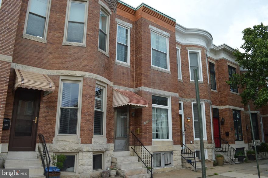 Federal Hill just a few blocks from the harbor.   Quiet spot just off Fort Ave.   Three bedrooms and full bath off the hall on the second floor, with plenty of space to add a second bath on that level.   Front bedroom offers oak flooring.  1/2 bath on the first floor.  ceiling height on the first floor is over 9 feet.  Oak flooring in two rooms on the first floor.   Basement is about 5'10" and is unfinished.   Rear yard is fenced.  Neighbor next door took down their fence and installed an off street parking space.