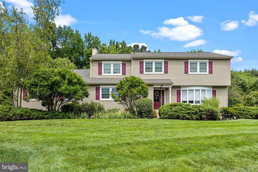 978 Weber Road in Yardley is a colonial residence that seamlessly blends timeless charm with modern functionality. Boasting over 3100 square feet of intelligently designed living space, this home offers a unique blend of practical features and enduring appeal. Upon entry, a small foyer welcomes you with wainscoting detail. To the right, the living room, with a big bay window, connects to the formal dining room, creating an open flow that extends into the eat-in kitchen. Handcrafted custom hardwood floors add character to the living areas. The kitchen, equipped with stainless steel appliances, offers modern convenience and plenty of storage. A step down reveals the cozy family room with wood burning fireplace, built-ins and detailed molding. From the family room, a hallway provides access to the backyard/patio door, a full bathroom, and a powder room. Additionally, there's a cedar room that serves as an office with sliding doors leading to the backyard patio area. Upstairs, the primary bedroom suite features a generously sized walk-in closet. Originally a sitting room, it offers added functionality. The primary bedroom also boasts a private full bath and a storage area with easy access to the upper-floor laundry room. An additional cedar closet offers more storage. Three additional bedrooms on this level include bedroom 3 and 4, both with two closets each. The hall bath is equipped with a tub shower. The basement features a full wet bar with a sink and refrigerator, perfect for hosting gatherings. Additionally, the basement offers a spacious storage room. Outside, the property presents lush lawns, a wooded backdrop, and a covered patio, offering a tranquil outdoor retreat. With its curb appeal and meticulously tended landscaping, 978 Weber Road is an inviting colonial home in Yardley, ready for you to make it yours.