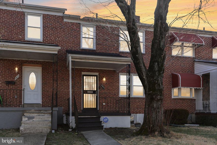 Welcome to 5811 The Alameda, where convenient city living meets comfort in this spacious 1,600 square foot home featuring 4 bedrooms and 2 full bathrooms. Situated just off The Alameda, this home offers convenient street parking (with restrictions from 4–6 PM) as well as a private rear parking pad for off-street parking. Step inside to find a warm and inviting main level with coffered ceilings, elegant chandeliers, and recessed lighting that enhances the living and dining spaces. Hardwood flooring flows throughout the main and upper levels, creating a cohesive and modern feel. The updated kitchen features modern stainless steel appliances, granite countertops, and a gas stove making it perfect for everyday living and entertaining. Upstairs, you’ll find three spacious bedrooms and a full bathroom with modern fixtures. The finished basement offers additional living space with fresh neutral carpeting, a fourth bedroom, and a second full bathroom. The basement also provides walkout access to the backyard, creating a convenient separate entrance. Outside, enjoy the backyard space ideal for relaxing or entertaining, along with access to the private rear parking pad. Located just minutes away from Baltimore's Inner Harbor where you can find Camden Yards and M&T Bank Stadium! Don’t miss the opportunity to make this Baltimore home yours!