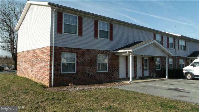Second floor - Two bedroom, One bath apartment in Guilford Manor. Property maintenance included. Stove, Refrigerator & Dishwasher included. Washer Dryer hook-up. Tenants pay all utilities. $51 per month for water/sewer. Pets on a case by case basis.