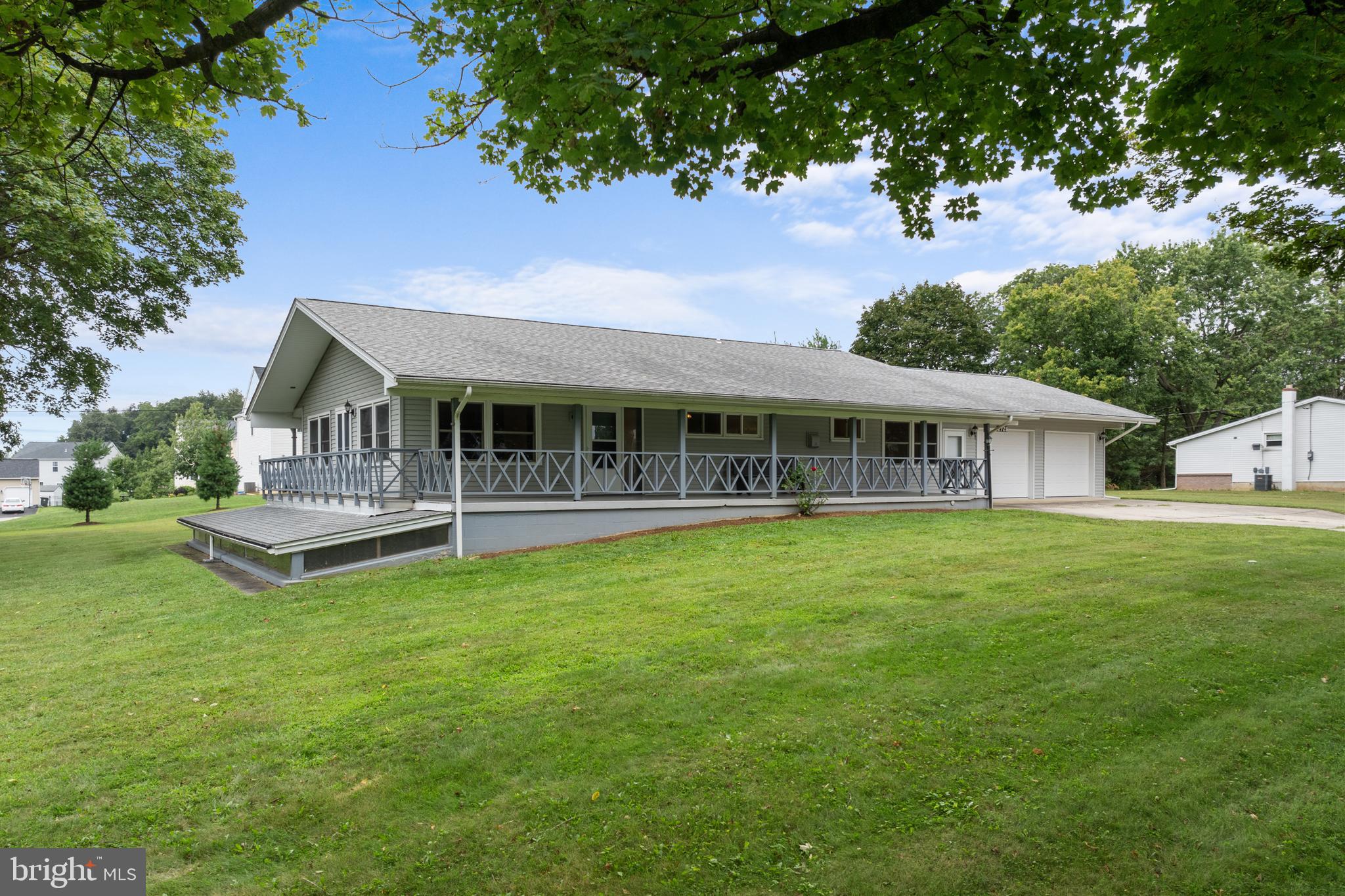 ***ALL OFFERS DUE BY TUESDAY 9/9 @ 5PM***Well-built by its original owners, this 4-bedroom, 1.5-bath Ranch sits on a flat 1-acre lot in Upper Macungie Township and the desirable Parkland School District. Offering approx. 1,700 sq ft of easy one-floor living, this home is nestled in a quiet suburban setting yet close to everything. The living room features custom woodwork and leads to an efficient kitchen and spacious dining area. Down the hall, you'll find the primary bedroom, three additional bedrooms, and 1.5 baths—plenty of space for everyone.
One of the home’s standout features is the enclosed breezeway between the oversized 2-car garage and kitchen. With laundry, soaring beam-lined ceilings, and a cozy brick hearth, this 335 sq ft space functions as a large great room—perfect for gatherings and entertaining. The expansive and dry basement includes a workshop, utility room, and immense storage area with excellent finishing potential. Out back, a large concrete pad awaits your patio design, and a generous storage shed completes the property. With New roof & siding in 2019, major items are done—just bring your ideas to make it your own. Close to shopping, restaurants, and major roadways, yet far enough for peace and privacy, this solid Ranch is ready for its second owners. Showings begin Tuesday, 9/2. Open House Saturday, 9/6 from 12–2 PM.