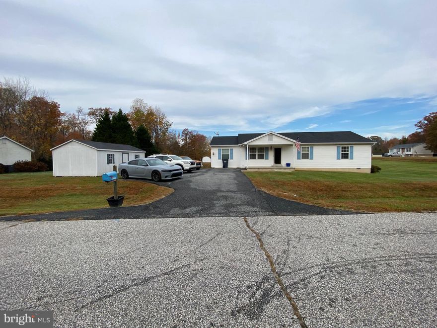 This charming rambler boasts a fresh interior design. With three bedrooms and two bathrooms, this well-maintained home offers a cozy living space. Nestled on a spacious plot of land spanning over an acre, it provides a serene and tranquil environment. Conveniently located, it offers effortless access to transportation and shopping amenities.