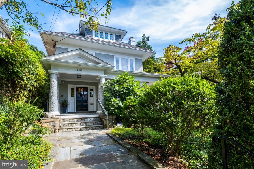 TURNKEY RENOVATED quintessential Cleveland Park Foursquare! Wonderful southern light and views of the serene, leafy surroundings as well as the National Cathedral stream through countless large windows throughout the sizable (approx 5,500 SF) interior on four finished levels. A wide front porch leads to an airy main level with 9.5' ceilings composed of an elegant foyer, living room with fireplace, dining room, and gourmet kitchen open to spacious family room with fireplace overlooking the ethereal and incredibly private backyard with large ipe deck and POOL surrounded by mature plantings. Upstairs are 7 bedrooms and 3 bathrooms including a grand primary suite with fireplace, dressing room, and en suite bath. Fully finished LL features a family room, bedroom, full bath, gym, wine room, and storage. Dream neighborhood location - just steps to multiple schools & shopping on Wisconsin Ave!