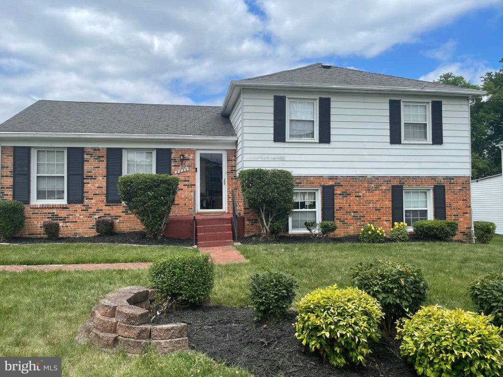 Photo of 2200 Oaktree Lane, TEMPLE HILLS, MD 20748 (MLS # MDPG2209004)