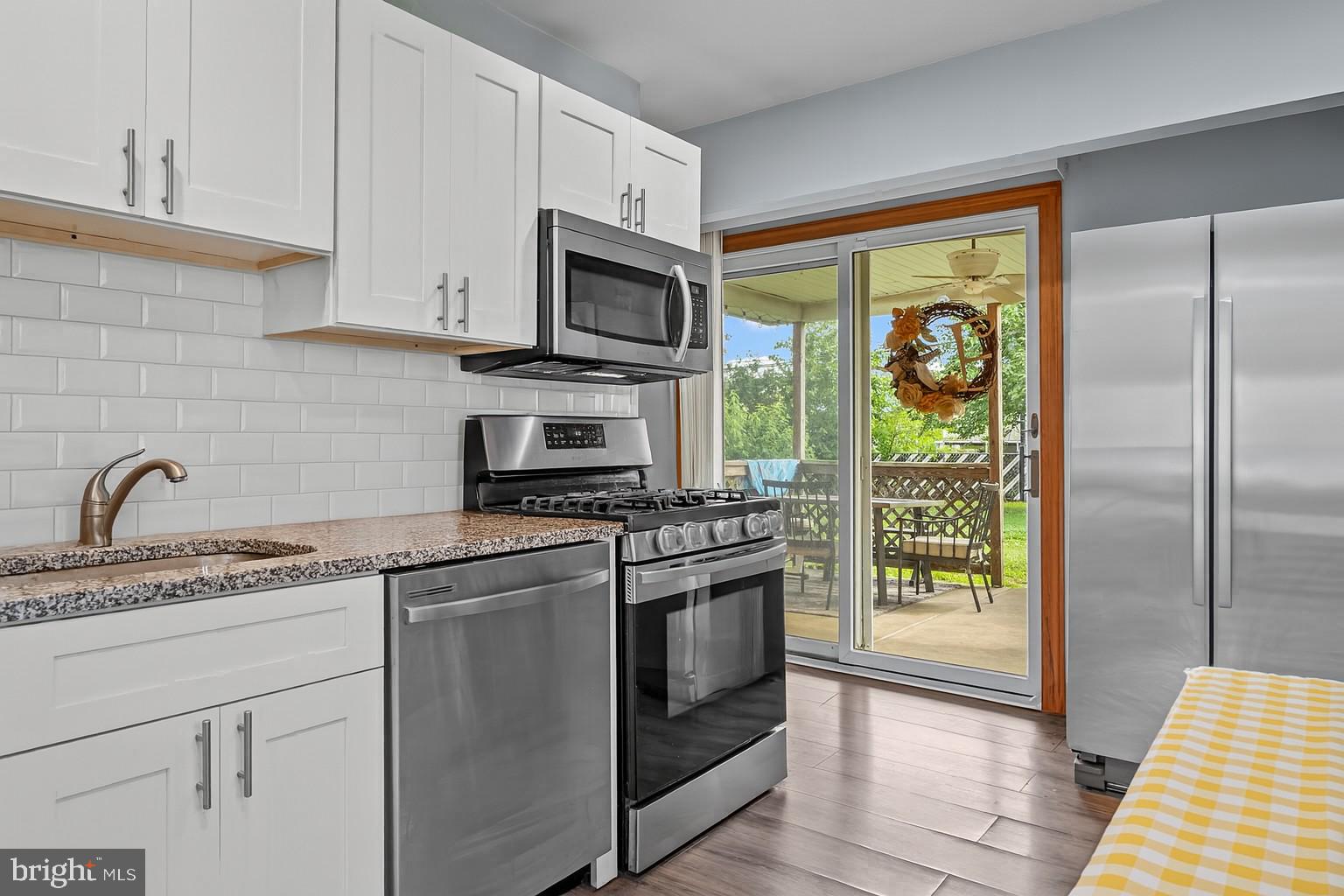This well-maintained home offers key updates and versatile spaces, inside and out. Major mechanicals have been recently upgraded, including a new HVAC system (2021) and hot water heater (2022). The kitchen was updated in 2020 and features Samsung stainless steel appliances, granite countertops, white shaker cabinets, and a classic subway tile backsplash. The bathroom was also refreshed with stylish, neutral finishes.
Enjoy vinyl plank flooring throughout, offering durability and a cohesive look in every room. A sliding glass door leads to the covered back patio, creating an easy indoor-outdoor flow for relaxing or entertaining. A very large backyard shed provides excellent storage or workspace options.
Convenient location close to shopping, dining, and major routes.
Showings begin soon — don’t miss this one.
professional photos will be coming soon