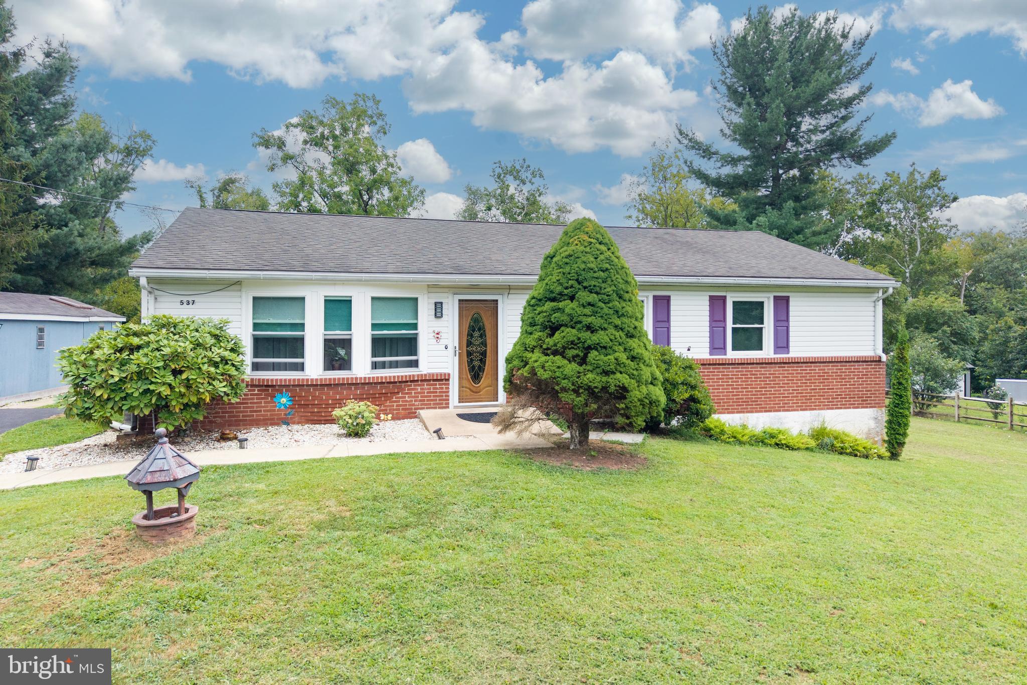 East Coventry Rancher for sale. Owen J Roberts School District. This 3 bedroom home features hardwood flooring in the living room and a family room with brick wood burning fireplace. There is a nice rear yard, backed by woods. The kitchen has recently been upgraded with up lighting and under counter lighting. The family room is cozy and there are 2 sliding glass doors that let in lots of natural light. The deck wraps around the family room. The laundry room is located on the main floor. The lower level was once finshed as addtional space for family. With a little elbow grease the buyer can revive this area.
