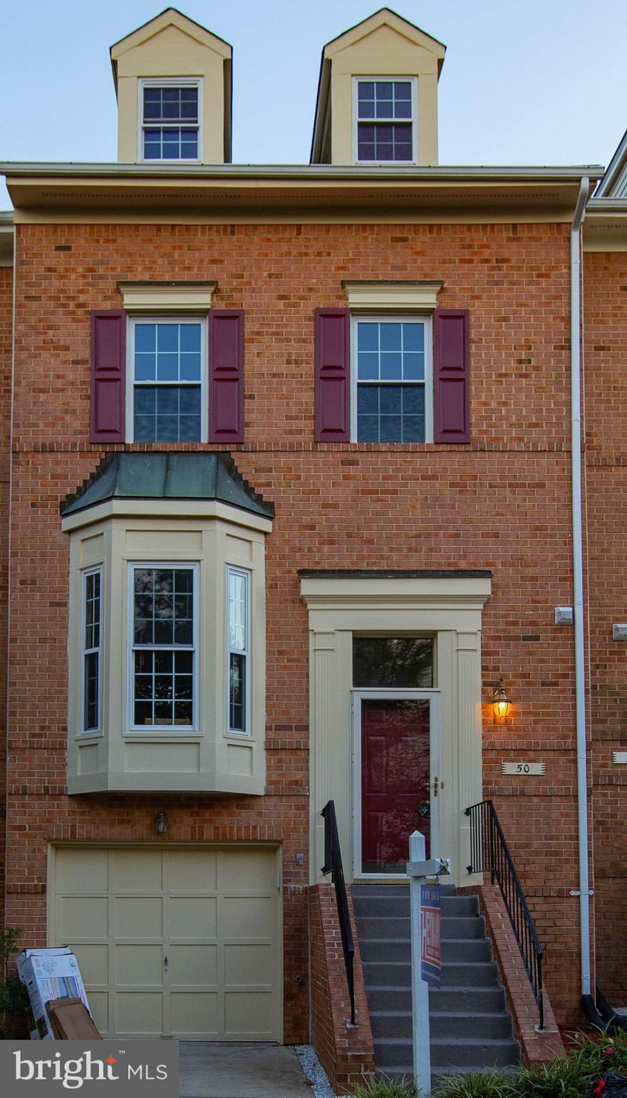 Welcome to this elegant and magnificent sun-drenched multi-level luxury townhouse in Nottingham Woods with 3BR, 2FB & 2HB. Walk into open main level to find gleaming new hardwood floors, Palladian windows,12 foot ceiling, and French doors leading to custom-designed private deck. New energy efficient windows, finished walkout basement w/fireplace, kitchen w/granite countertops and ceramic flooring,